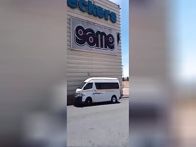 MAN FALLS AT LEAST TWO STOREYS