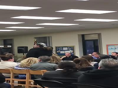 WTF!! RETARD PARENT PULLS A KNIFE ON TEEN DURING SCHOOL MEETING TO PROVE SOMETHING