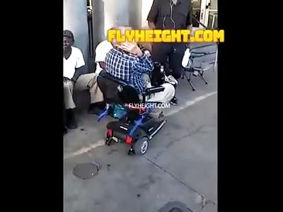 Old man in scooter gets off lucky with a slap to the head !!