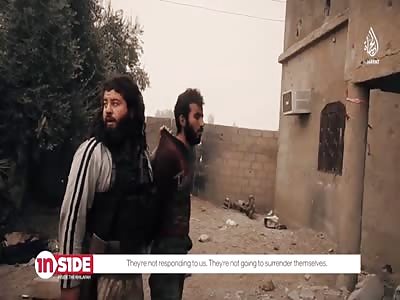 ISIS Blow Up A Building With Soldiers Hiding Inside And Humiliate Enemies Corpses.