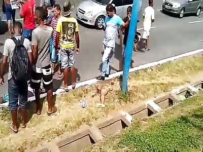 Aftermath Of Motorcycle Accident And Removal Of Dead Rider