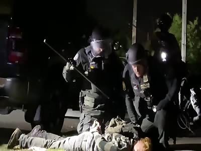 Portland Cops Beat/Punch And Pepper Spray Restrained Medic