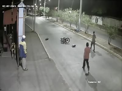 CCTV Records The moment Motorcyclist Jumps The Curb And Hits A Post