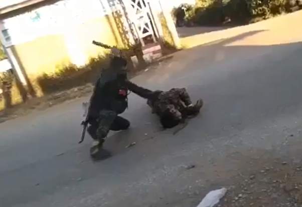 Man Getting Beheaded In The Middle Of The Road