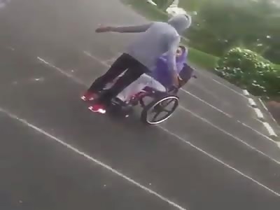 Girl fight / in wheelchair.