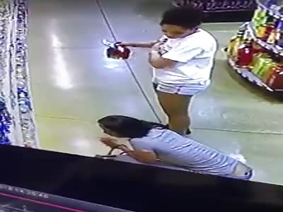 Two black chick caught red-handed stealing liquor...
