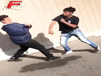 Little kid fights big white boy...