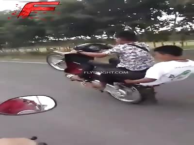 Thai guy wheelie his scooter but not for long...