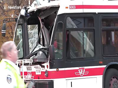Toronto utility worker has close call cutting power lines after bus cr