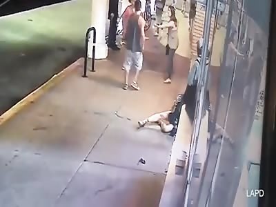 Aggressor Punches his Girl in the Face coming out of Store 