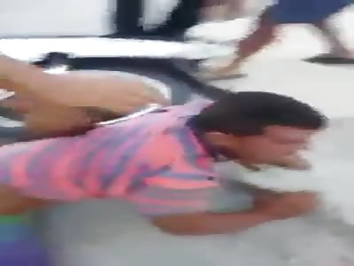Thief beaten and tied by popular