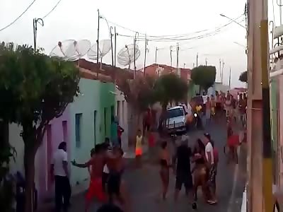 man brutaly beating in street brasil