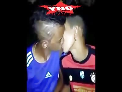 Thugs forced to kiss each other.