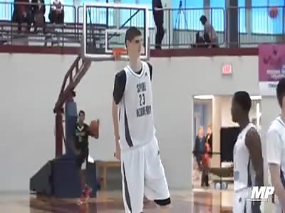 Giant kid playng basket