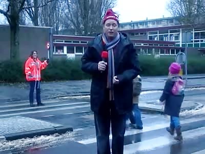 Weatherman run over during live broadcast n the Netherlands.