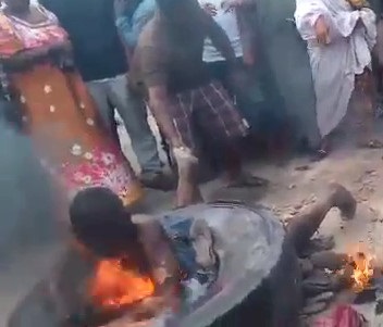 [More Footage] Burning a man for rapist