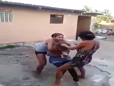 Two girls hitting a girl