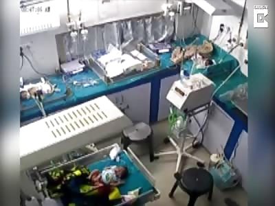 Indian hospital worker 'breaks a baby's leg' for crying