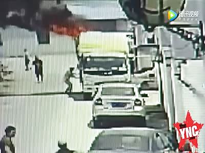 brave china man drives burning lorry away from buildings