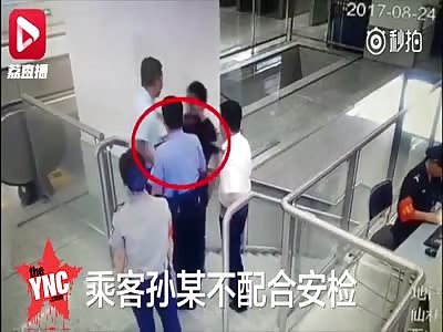 man pushes  other man down flight of stairs breaking many bones