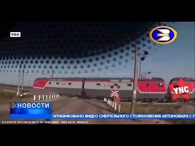 in Russia a woman died when the car she was driving crashed into a train
