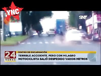 in  Paraguay a motorcycle, was rammed by a taxi, in a dangerous collision. 