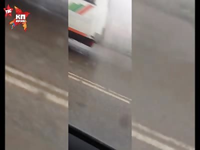 back from hell man drives a bus while its on fire in Russia 
