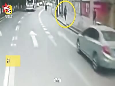 crazy woman tried to kill her self by jumping in front a bus in Hubei