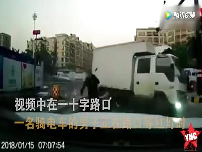 in Shandong a truck comes of no were crushing driver on his bike