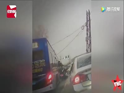 woman crushed by a bus in  Jiangsu