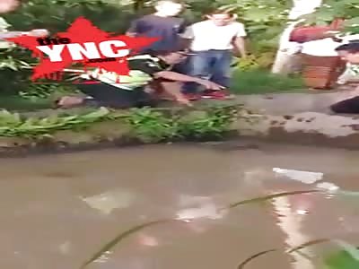 Students find a dead body in the school pond