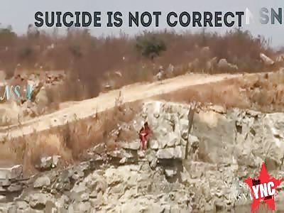 protest suicide a woman  kills her self in front of a crowd  at a quarry