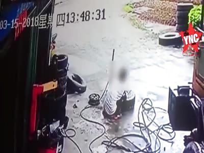 a tire auto repair shop accident in Guangdong