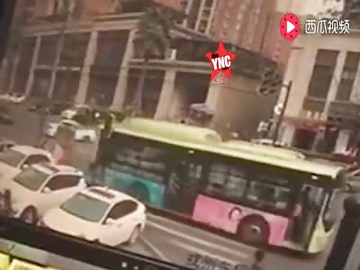 woman crushed by a bus on the zebra crossing in Yibin