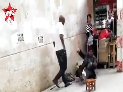 real karma : A bald-headed man beat a man sitting on the ground and then donnie yen kicks him to the ground