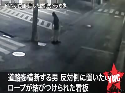 in japan a man rope-stretched a road causing a 45 old man on his bike to crash