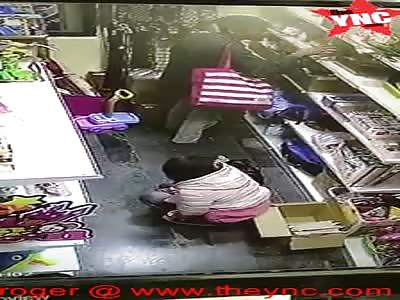 youth takes a piss on a shop floor in Taipei, Taiwan
