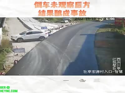 reversing Accident  bike collided into a car in Jiangxi