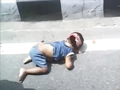 Little Child Dies in Strange Position on the Road 