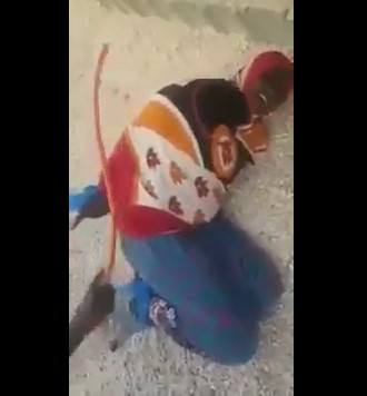 Muslim Woman is Whipped in the Middle of the Street