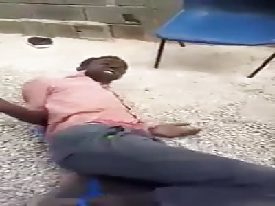 Thief being beaten by Cameroonian Armed Forces 