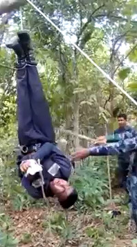 Police Hang Security guard Upside Down and Beaten Him