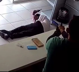 Another Angle: Armed Robber Try to Rob Phone Store , Get Fatally Shot by Owner 