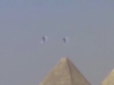 PYRAMID Shaped UFOs Filmed Hovering Above Egypt