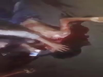 Woman cries while boyfriend lies dead in pool of blood