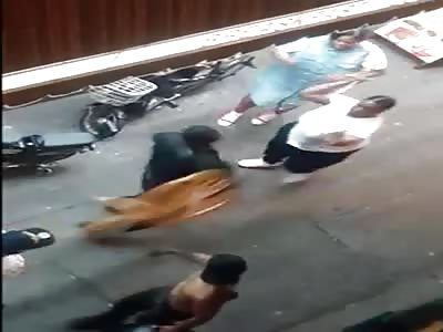 Man knocks out shit talking woman with a chair