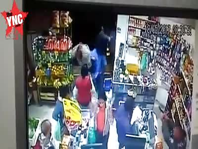 Stupid robbers shot at when robbing store with police inside