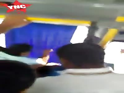 Thief gets a good beating on a bus