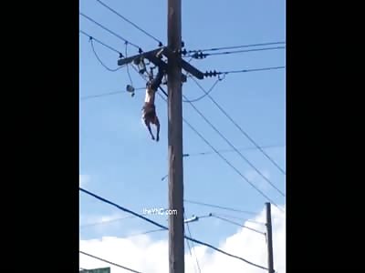 Shocking - Man in Extreme Agony being electrocuted by utility pole