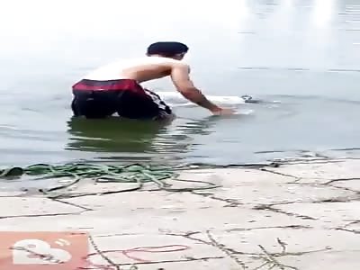 Drowned corpse pulled out of a river